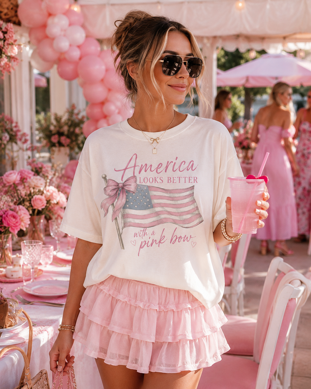 America Looks Better With A Pink Bow™ Tee